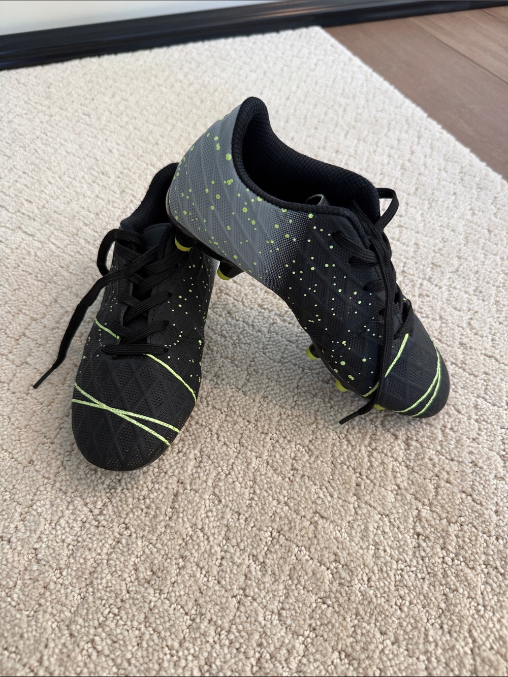 Kids Black and Neon Green Cleats